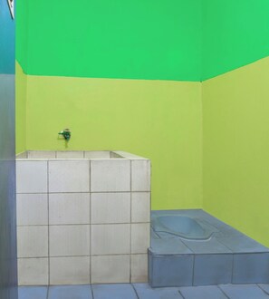Standard Double Room | Bathroom | Shower, towels, soap - Hotel O Guest House Amanda Syariah (Bandar Lampung)