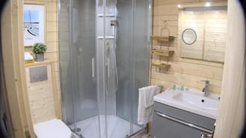 Douche, sĂšche-cheveux, serviettes fournies, savon