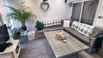 Exclusive Suite | Living area | 48-inch Smart TV with digital channels, Netflix, toys