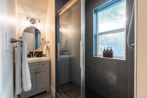 Shower, hair dryer, towels, soap - Modern Retreat | Game Room, Breweries & Fun (Post Falls)