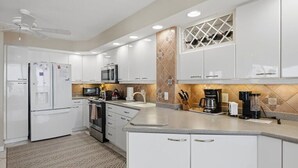 Private kitchen - Beachfront 2BR/3BA condo with pool, WiFi, and panoramic views. (Marco Island)