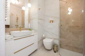 Shower, hair dryer, shampoo