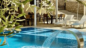 Seasonal outdoor pool, sun loungers
