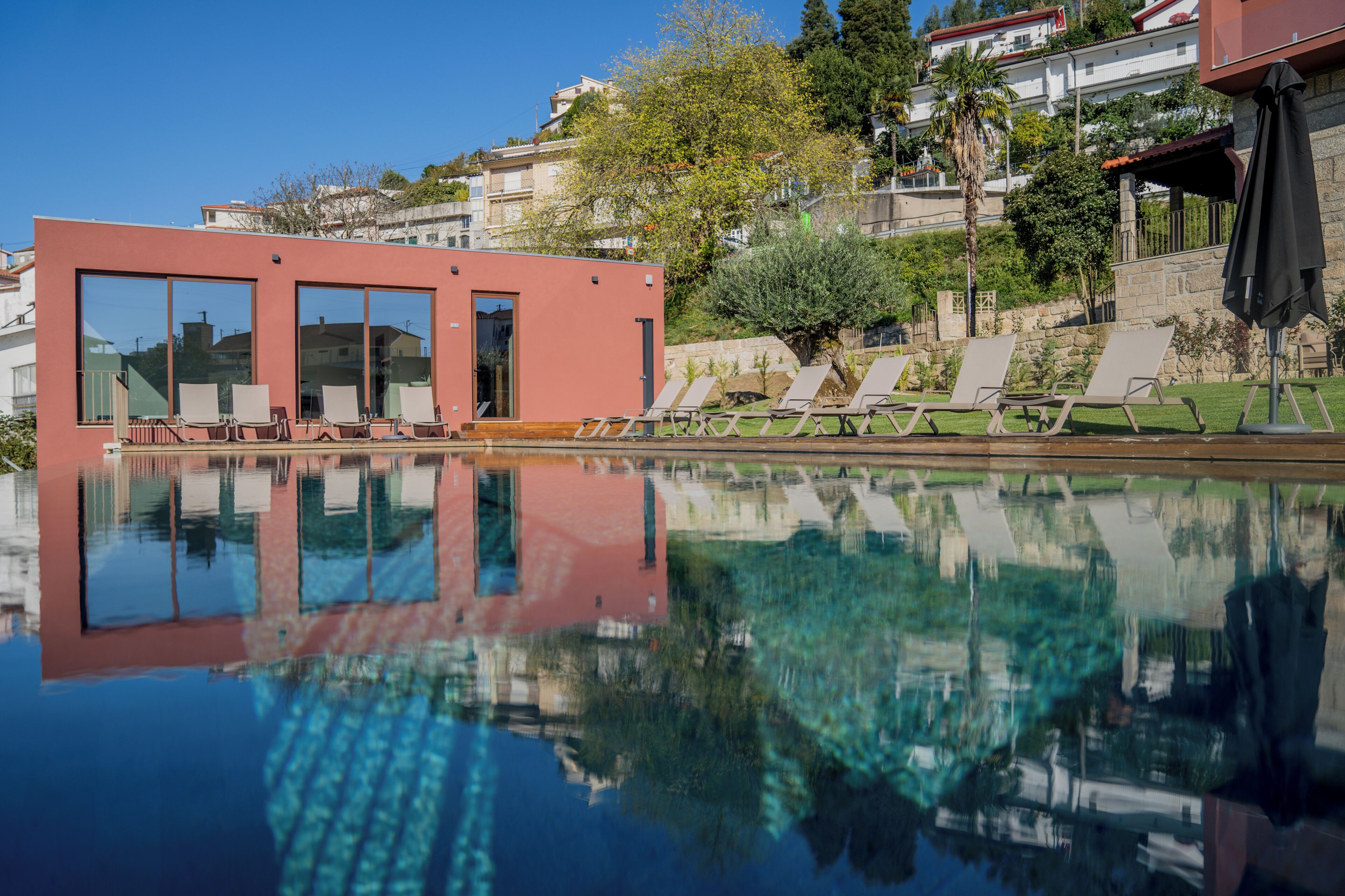 Outdoor pool, pool umbrellas, pool loungers
