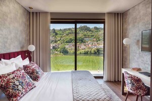 Deluxe Double Room, Balcony, River View | Laptop workspace, blackout drapes, soundproofing, iron/ironing board