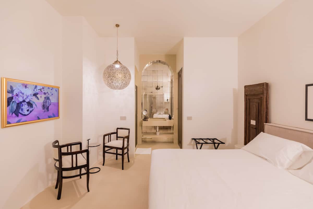 Suite Exclusive, vue cour intérieure | 1 chambre, literie de qualité supérieure, couette en duvet d'oie