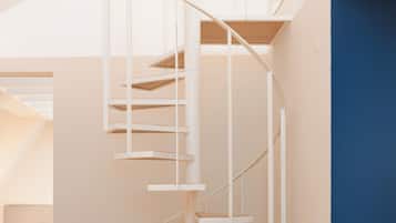 Two-Bedroom Apartment | Área de estar | TV de tela plana 55 polegadas com canais a cabo