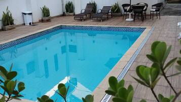 Indoor pool, outdoor pool, open 7:00 AM to 10:30 AM, pool umbrellas