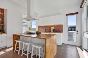 Fridge, stovetop, dishwasher, coffee/tea maker - Contemporary Home | Hot Tub + Rooftop Deck (New Orleans)