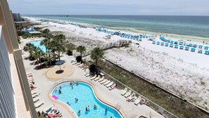 A resort with multiple swimming pools, beach access, and a pier in the background. - Azure #613 Updated Top Floor 3bdrm Sleeps 10! Views Galore! (Fort Walton Beach)