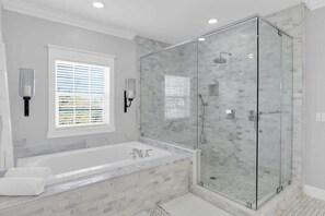 Shower, hair dryer, towels, shampoo