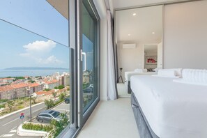 2 quartos, ferros/tábuas de passar roupa, Wi-Fi, roupa de cama