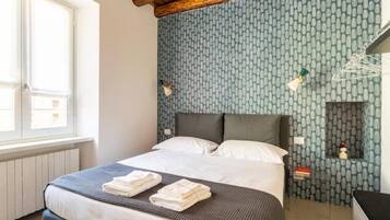 1 Schlafzimmer, Zimmersafe, Schreibtisch, Bügeleisen/Bügelbrett