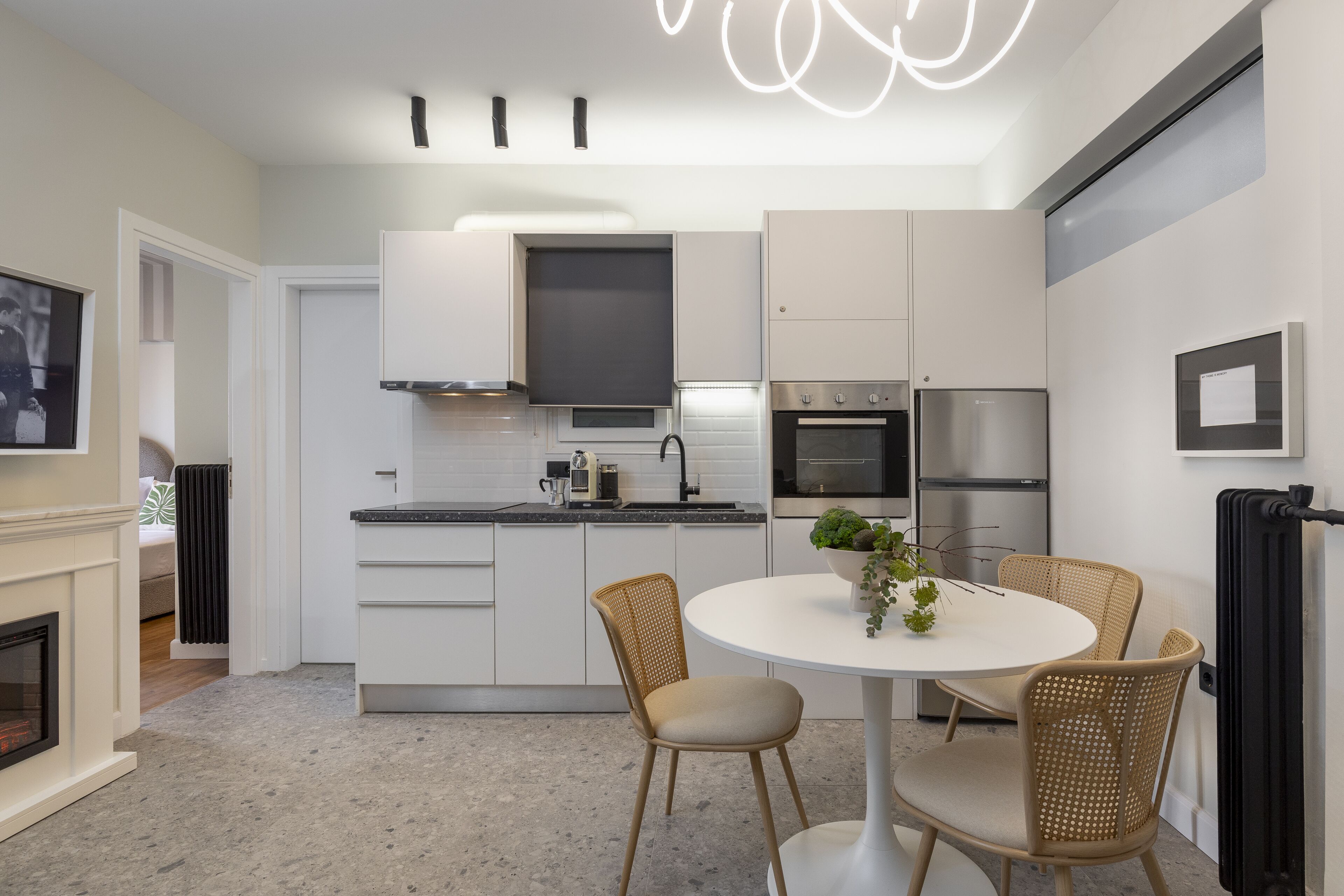 Design Apartment, 2 Bedrooms, Non Smoking | Living area | 24-inch Smart TV with cable channels