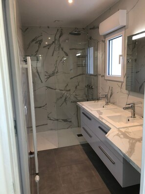 Shower, towels, toilet paper