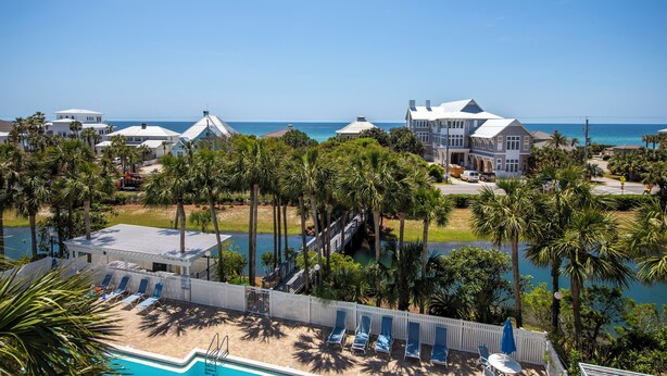A resort with a pool, palm trees, and ocean views. - Gulf View! Pool, Tennis Court, Beach Access (Santa Rosa Beach)