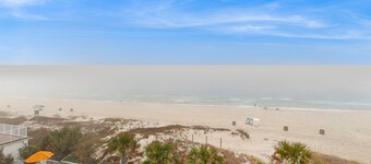 Dog-friendly beachfront condo with pool, hot tub, AC, & Gulf views
