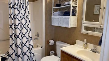 Hair dryer, towels, soap, shampoo