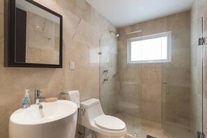 Hair dryer, towels, soap, shampoo