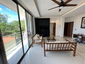 Living area - Modern Condominium Amazing Location!
(Cancún)