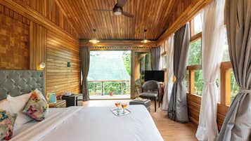 Premium Room, Garden View | 1 bedroom, individually decorated, individually furnished, bed sheets