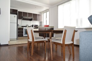 Enjoy meals in the spacious kitchen with a central island and dining area for four.