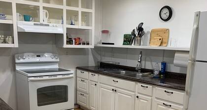 Walk to see salmon in Bear Creek. The entire bottom floor is your apartment.