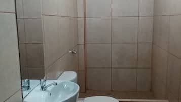 Shower, towels, soap, toilet paper