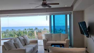 Family Apartment, 3 Bedrooms, Kitchen, Ocean View | Living area | 50-inch Smart TV with satellite channels