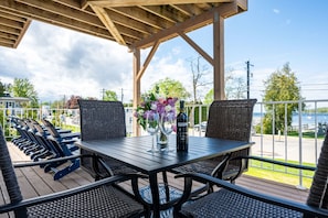 Outdoor dining - The Deckhouse | Water Views, Walk Downtown, Sauna (Fish Creek)