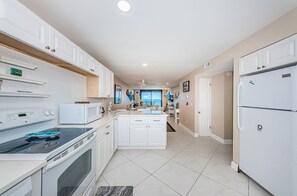 Fridge, microwave, oven, stovetop - Unobstructed Sunsets at Gulf Shores in Indian Shores 7th Floor 2/2 condo~ GFS709 (Indian Shores)