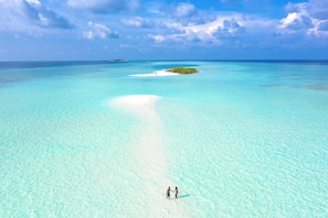 On the beach, sun-loungers, beach towels - Zen Exuma: Stunning Beachfront Villa w/ NEW Rooftop Lounge, Spa, Cabana & Pool! (Moss Town)