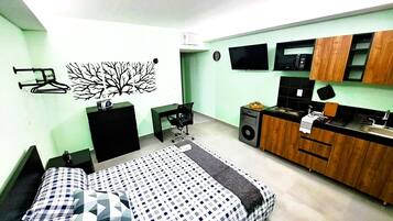 Departamento familiar, para no fumadores, cocina | 1 habitación, caja de seguridad en la habitación y escritorio