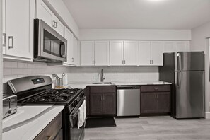Fridge, microwave, oven, stovetop - Urban Oasis  Sleek, Cozy & Well-Located (Rochester Hills)