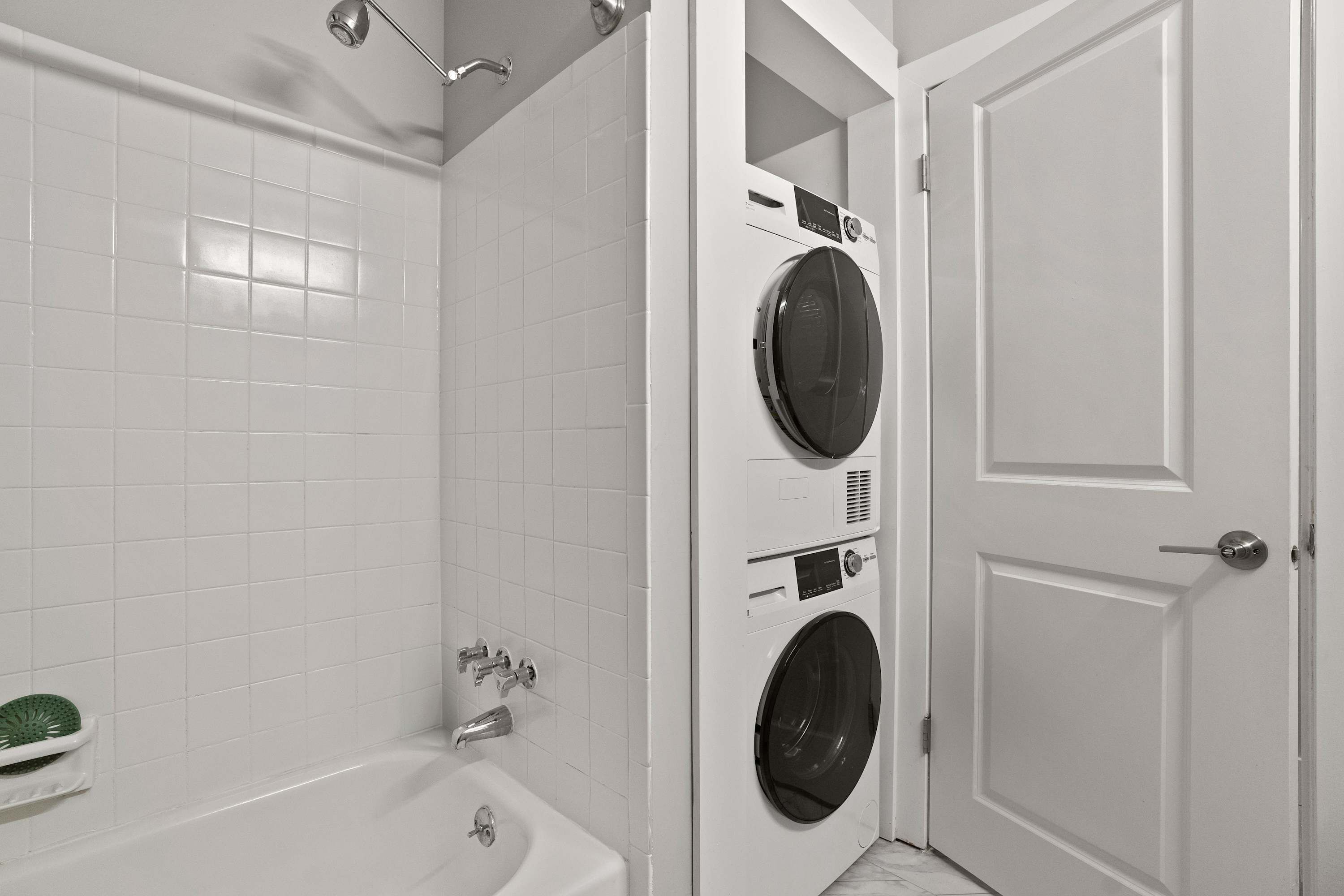 Shower, hair dryer, towels, shampoo