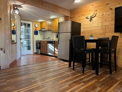 Family Deluxe Lodge Suite: full kitchen + arcade + walk to pool and rodeo