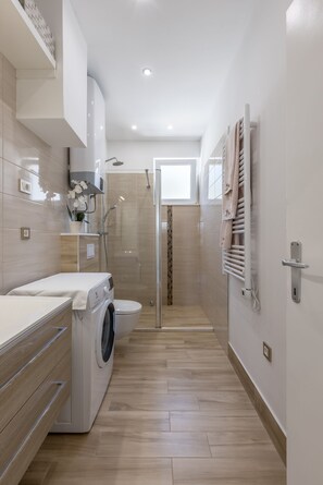 Shower, free toiletries, hair dryer, towels