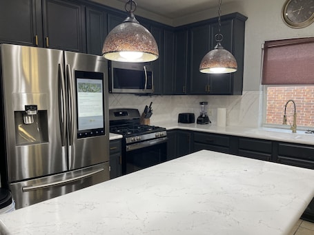 Fridge, microwave, oven, stovetop. Ultimate 8-Bed Wentink Retreat with 155” Theater, Poker & Pool Tables
