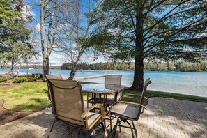 Outdoor dining - Cozy Lakeside Retreat on Long Lake - Sleeps 4 (Traverse City)