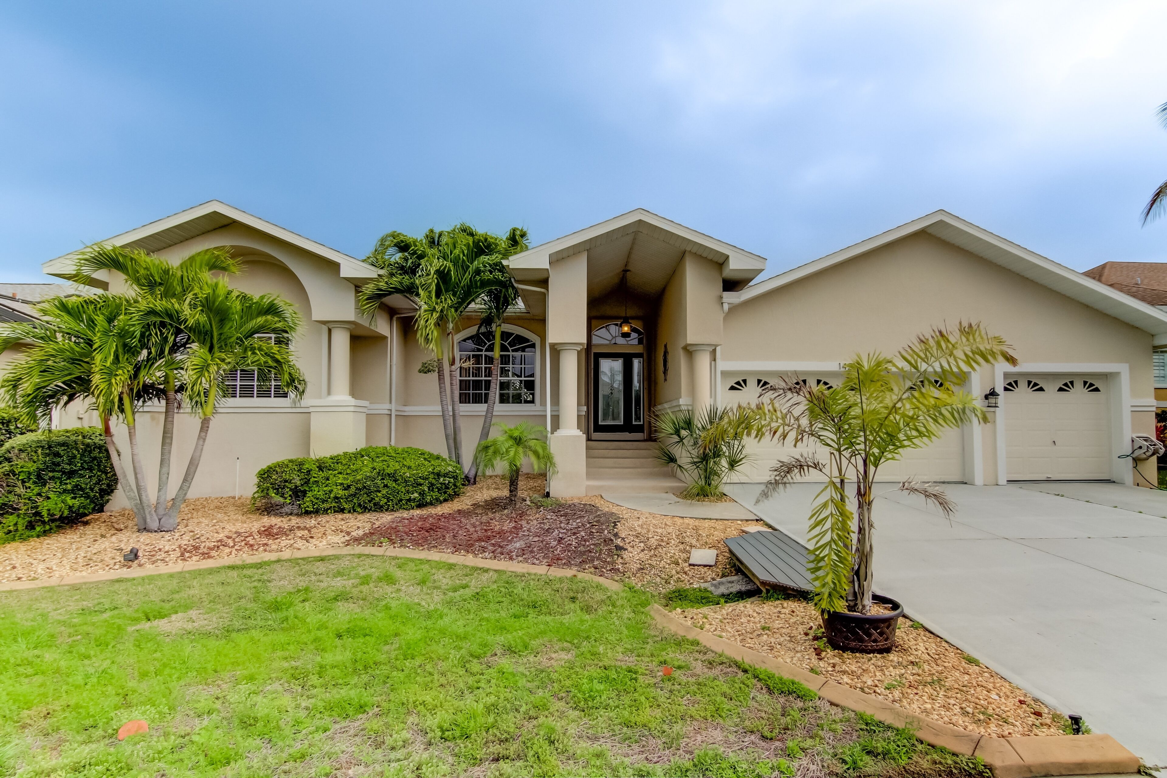 Luxurious home with private pool, spa, screened patio, AC, & W/D