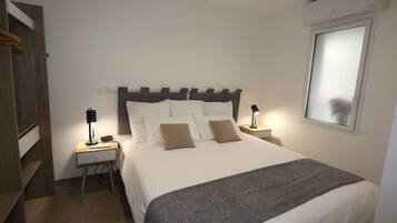 2 dormitorios, tabla de planchar con plancha, wifi gratis