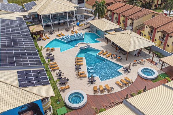 Outdoor pool, free cabanas, pool umbrellas