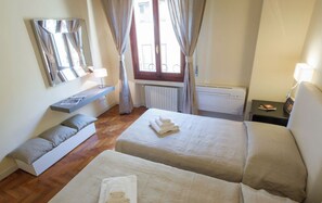 1 habitación, tabla de planchar con plancha, wifi y ropa de cama 