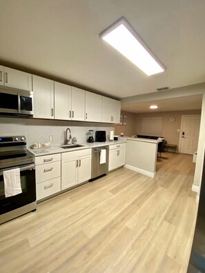 Apartment | Private kitchen | Stovetop, dishwasher, blender, cookware/dishes/utensils