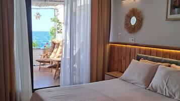 Deluxe Double Room, Terrace, Sea View | Individually decorated, individually furnished, desk, laptop workspace