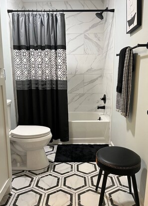 Hair dryer, towels, soap, shampoo