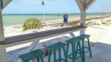 On the beach, sun loungers, beach towels