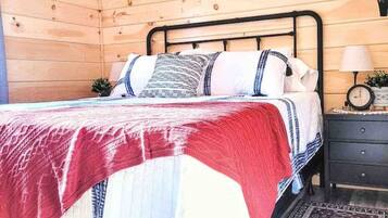 1 bedroom, desk, iron/ironing board, travel crib