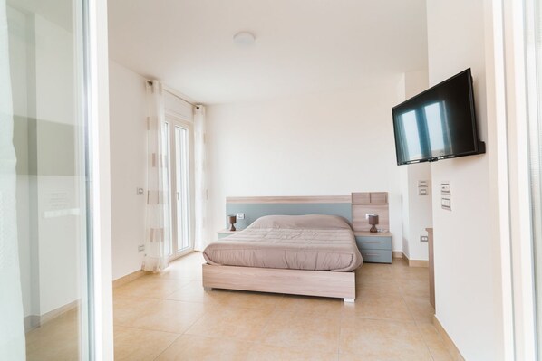 1 habitación, tabla de planchar con plancha, wifi y ropa de cama 