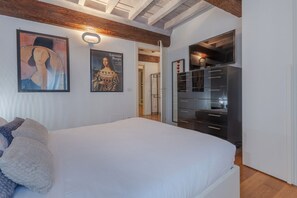 2 dormitorios, tabla de planchar con plancha, wifi y ropa de cama